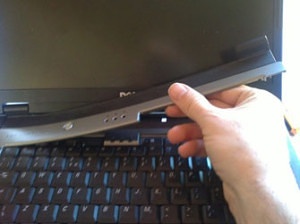 Removing-a-laptop-hinge-plate-cover