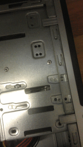 clips holding the front panel of the computer case